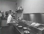 LascoBoard lining the walls in this food preparation area